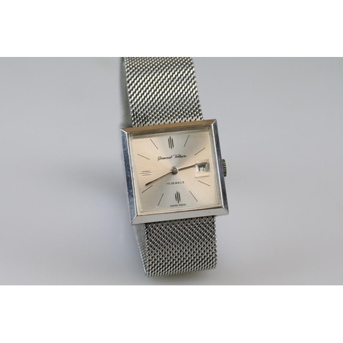 561 - Germinal Voltaire stainless steel wristwatch, date aperture, square silvered dial, baton numeral mar... 