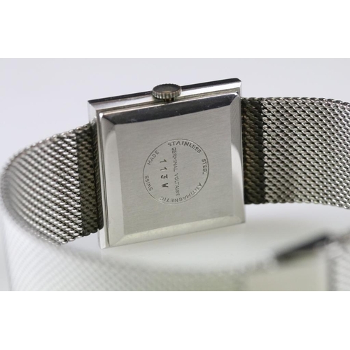 561 - Germinal Voltaire stainless steel wristwatch, date aperture, square silvered dial, baton numeral mar... 