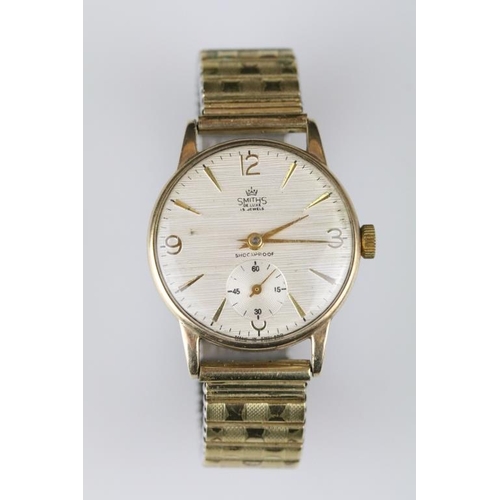 567 - Smiths 9ct gold cased Gents wristwatch, textured dial and seconds dial, gold Arabic and baton numera... 