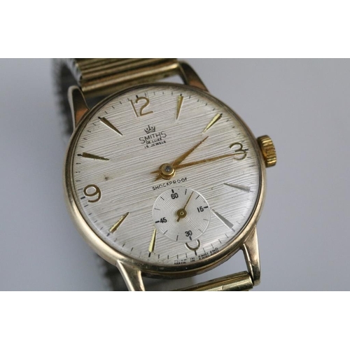 567 - Smiths 9ct gold cased Gents wristwatch, textured dial and seconds dial, gold Arabic and baton numera... 