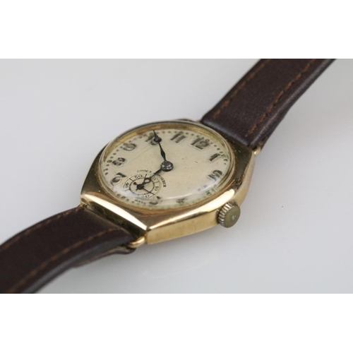 570 - Gents wristwatch, yellow metal case, circular champagne dial, Arabic numerals, poker hands, replacem... 