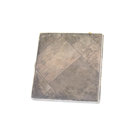 664 - Mid Century silver cigarette case having a engraved geometric case, together with a silver backed cl... 