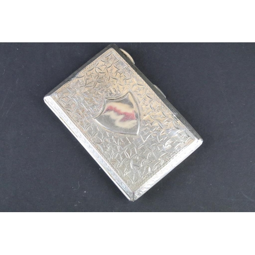 807 - Four silver hallmarked items to include a silver cased card case with leather interior and pencil (h... 