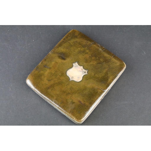 807 - Four silver hallmarked items to include a silver cased card case with leather interior and pencil (h... 