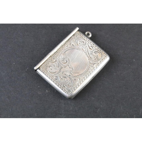 810 - Group of antique silver pocket items to include; a Victorian vinaigrette (Birmingham 1866, George Un... 