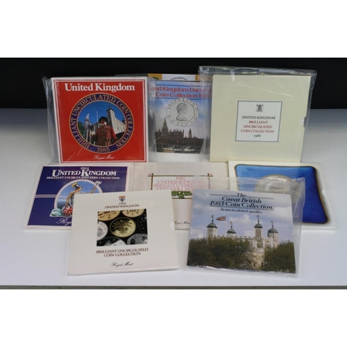 263 - A collection of United Kingdom Royal Mint uncirculated coin year sets to include 1982, 1983, 1984, 1... 