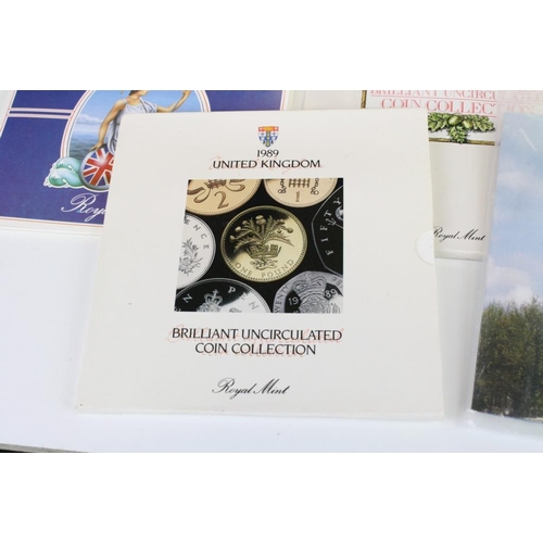 263 - A collection of United Kingdom Royal Mint uncirculated coin year sets to include 1982, 1983, 1984, 1... 