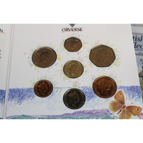 263 - A collection of United Kingdom Royal Mint uncirculated coin year sets to include 1982, 1983, 1984, 1... 