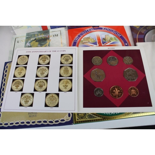 264 - A collection of United Kingdom Royal Mint uncirculated coin year sets to include 1990, 1991, 1992, 1... 