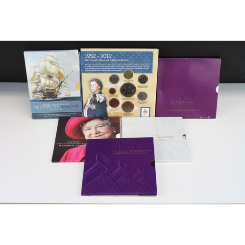 268 - A collection of United Kingdom Royal Mint coin sets to include the 2007 Diamond Wedding Crown, 2002 ... 