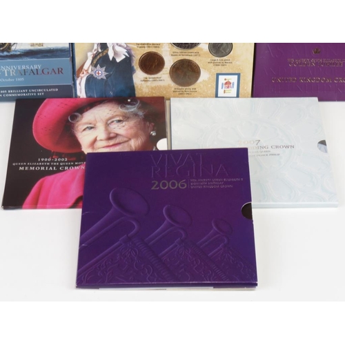 268 - A collection of United Kingdom Royal Mint coin sets to include the 2007 Diamond Wedding Crown, 2002 ... 