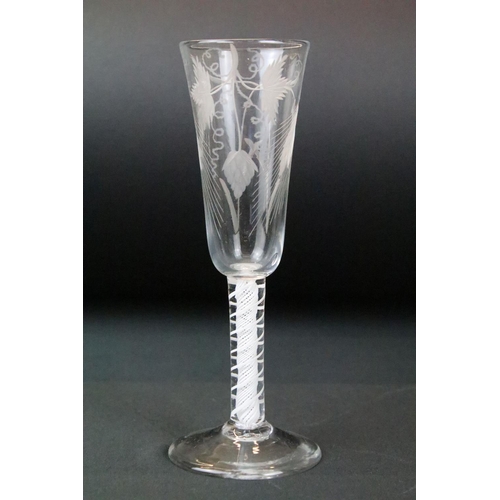 17 - Two antique glasses to include an 18th Century ale glass with double series air twist stem with etch... 