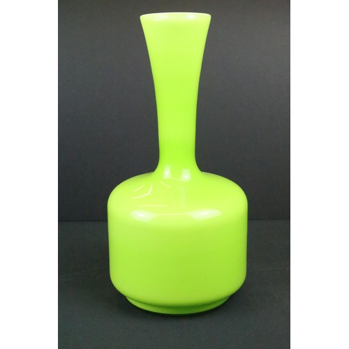 22 - Three pieces of 20th century coloured glass to include a green vase of bulbous form, green glass foo... 