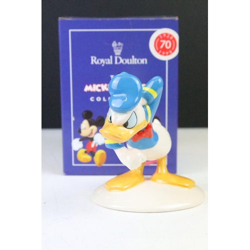 25 - Six boxed Royal Doulton 'The Mickey Mouse Collection' porcelain figures to include Mickey Mouse (MM1... 