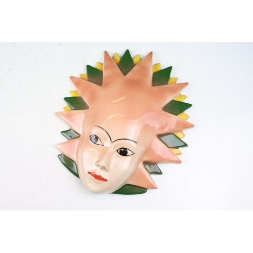 28 - Two Crown Devon pottery wall masks, painted by Dorothy Ann, measure approx 24.5cm high