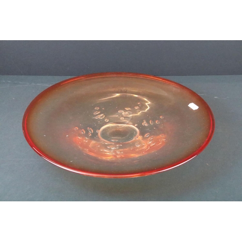 41 - Three pieces of 20th century studio glassware to include an orange circular dish with air bubble det... 