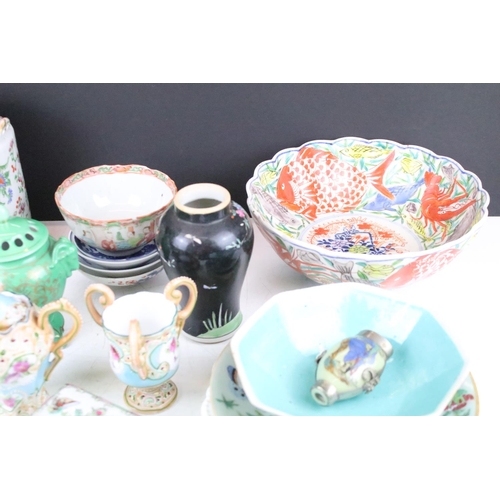 58 - Mixed ceramics, mostly Oriental examples, to include a Famille Rose teapot & cover (17cm high), Fami... 