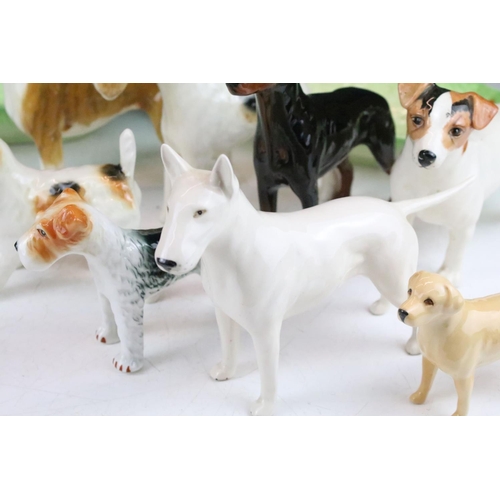 75 - Collection of Beswick dogs to include Jack Russell, Boxer, English bull terrier, terriers, Doberman ... 