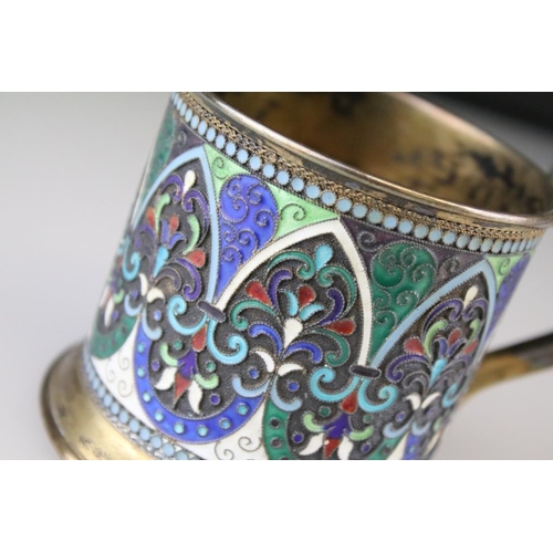 661 - Early 20th Century Russian silver cloisonné enamelled cup. The cup having a footed base with stirrup... 