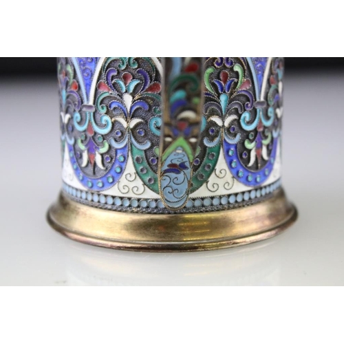 661 - Early 20th Century Russian silver cloisonné enamelled cup. The cup having a footed base with stirrup... 