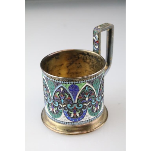 661 - Early 20th Century Russian silver cloisonné enamelled cup. The cup having a footed base with stirrup... 