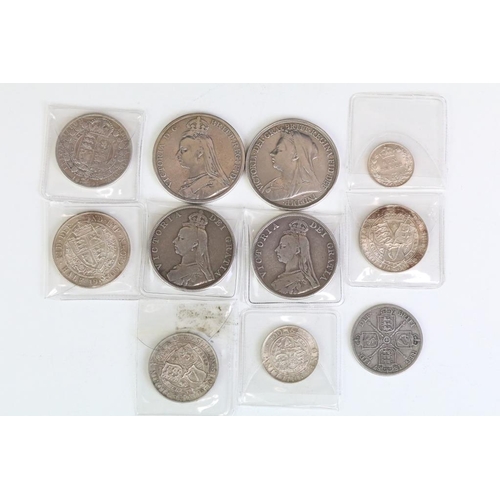 298 - A collection of eleven Queen Victoria silver coins to include Crowns, Double Florins, Half Crowns, F... 