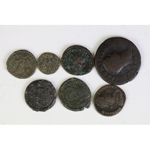 305 - A small collection of Roman Bronze coins.