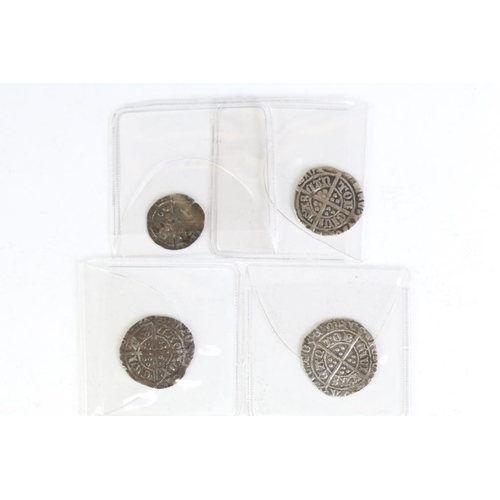 314 - A collection of four British King Henry VII hammered silver coins to include a York penny and three ... 