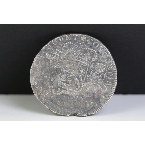 315 - A silver coin recovered in 1971 from the The Dutch East-Indiaman Hollandia sunk in 1743.