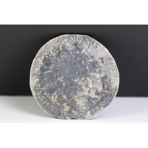 315 - A silver coin recovered in 1971 from the The Dutch East-Indiaman Hollandia sunk in 1743.