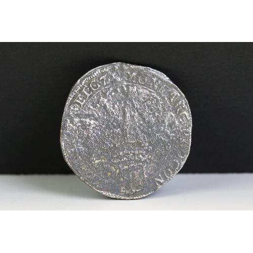 317 - A silver coin recovered in 1971 from the The Dutch East-Indiaman Hollandia sunk in 1743.