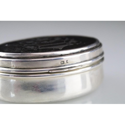 805 - German silver snuff pill box of oval form with neo classical cherubs and urns to the lid (marked wit... 