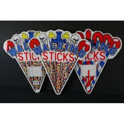 414 - Three fairground style 'Walking Sticks' wall hanging signs, approx 40cm long