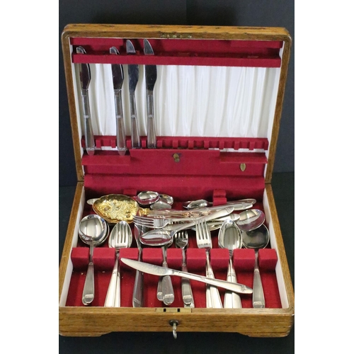 415 - Sheffield silver plate canteen of cutlery, with cast floral decoration to handles, plus additional s... 