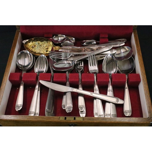 415 - Sheffield silver plate canteen of cutlery, with cast floral decoration to handles, plus additional s... 