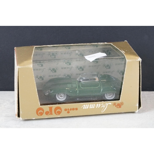 216 - A group of automobile collectables to include ephemera and two diecast models.