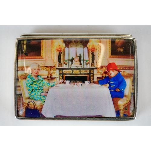 220 - Silver Pill Box with enamel lid depicting Paddington Bear and Queen Elizabeth II taking tes