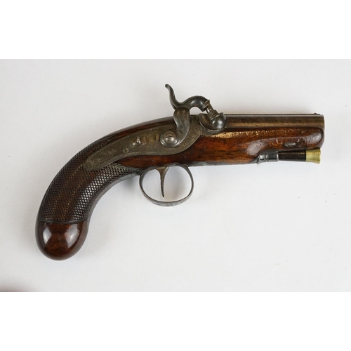 227 - An antique percussion travelling pistol by Trulock & Son of Dublin.