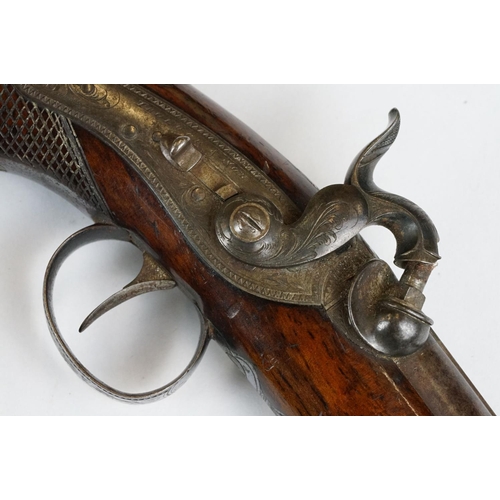 227 - An antique percussion travelling pistol by Trulock & Son of Dublin.