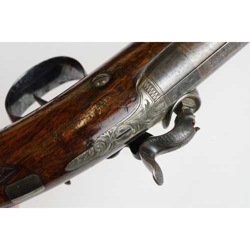 227 - An antique percussion travelling pistol by Trulock & Son of Dublin.