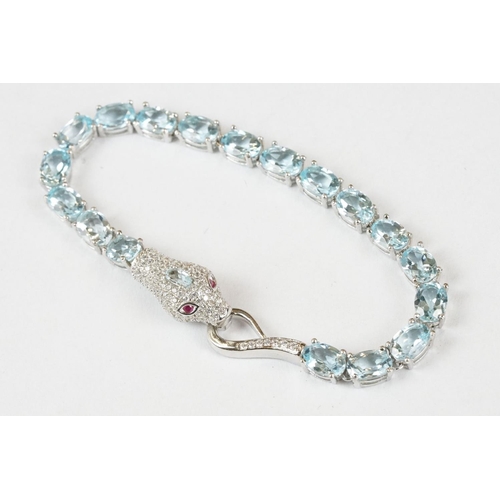 235 - Silver CZ and Aquamarine Bracelet with snakehead clasp set with ruby eyes