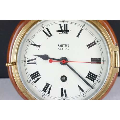 121 - Smiths Astral brass bulkhead nautical ships clock, with bevelled glass front, the cream dial with bl... 