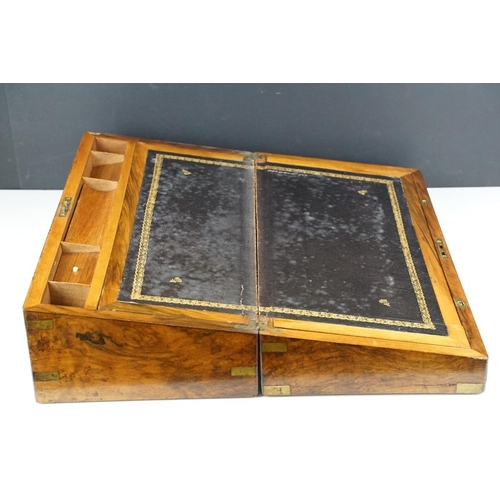 123 - 19th century brass bound burr walnut writing slope, opening to a lined slope and typical storage com... 