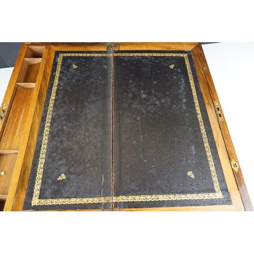 123 - 19th century brass bound burr walnut writing slope, opening to a lined slope and typical storage com... 