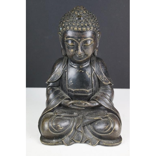 129 - Cast bronze figure of a Thai seated Buddha (approx 21cm high), together with a WW1 brass trench art ... 