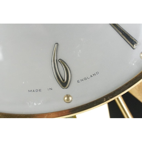 132 - Mid 20th C Metamec brass & teak sunburst wall clock, the silvered dial with applied Arabic numerals.... 