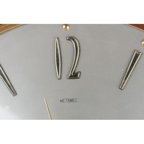 132 - Mid 20th C Metamec brass & teak sunburst wall clock, the silvered dial with applied Arabic numerals.... 