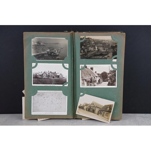 442 - Early 20th century postcard album, housing over 100 early 20th century onwards postcards, covering a... 