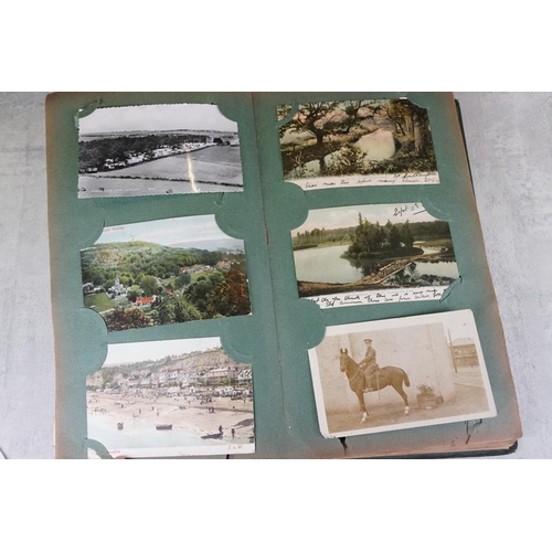 442 - Early 20th century postcard album, housing over 100 early 20th century onwards postcards, covering a... 