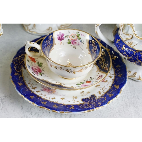 92 - 19th century tea ware with floral decoration & cobalt blue glazing on a white ground, to include tea... 